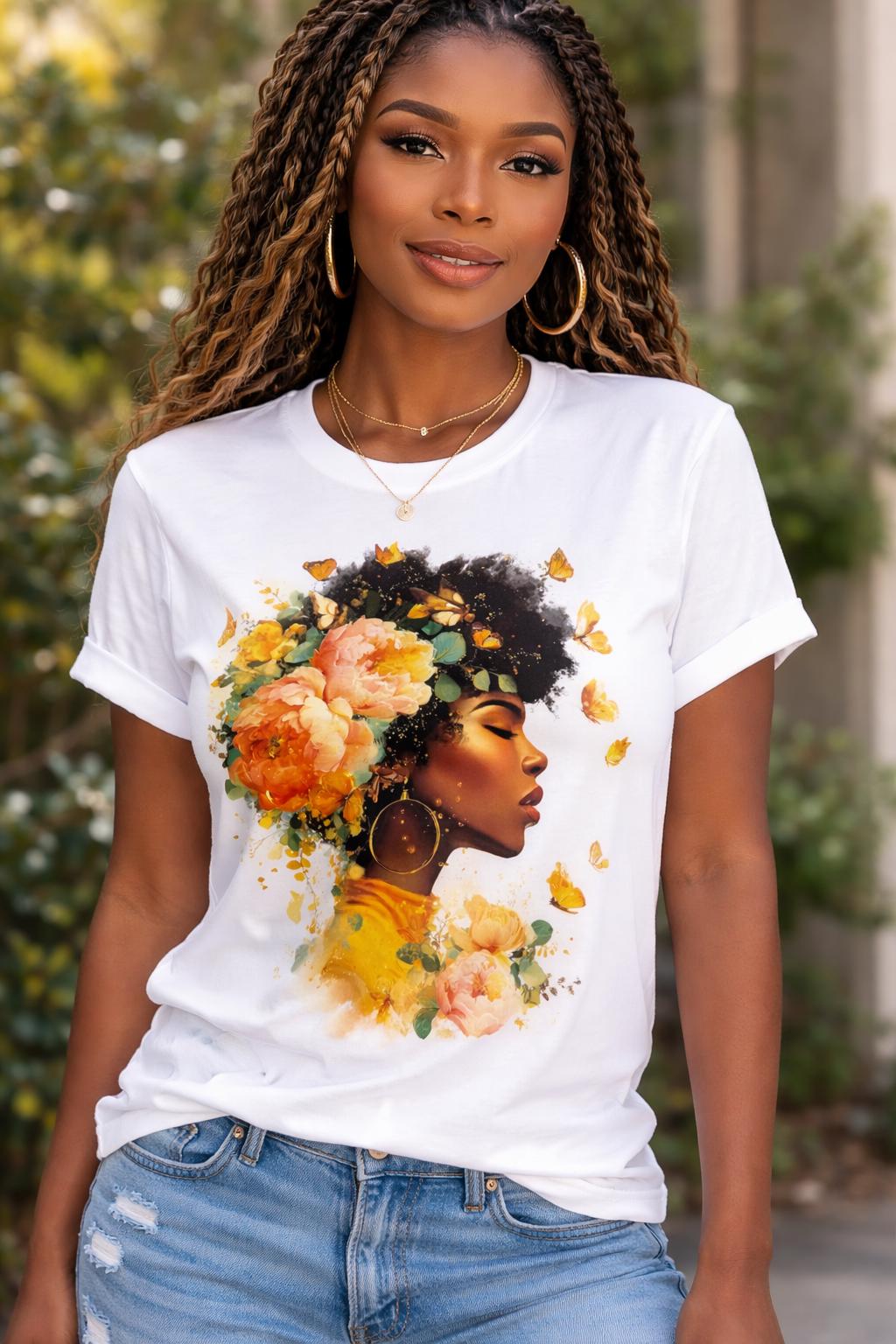 She Blooms Graphic Tee shown on a model, Black woman floral butterfly design