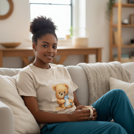 NICU Teddy T-Shirt styled with scrub pants seated pose