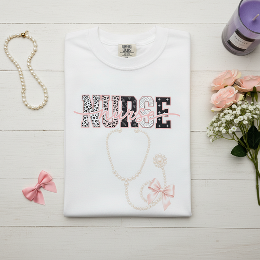 The Pearl Nurse Tee - styled flat lay